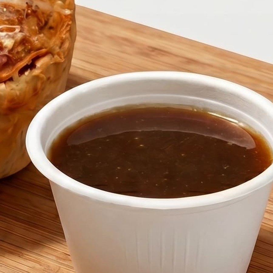 Close-up of house-made au jus dipping sauce